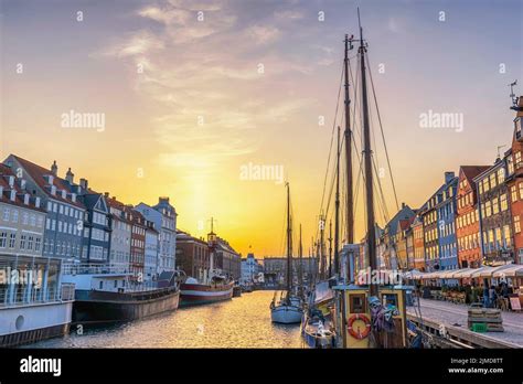 Copenhagen Denmark, sunset city skyline at Nyhavn harbour with ...