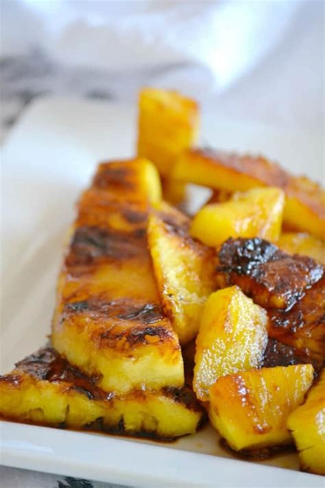 This Grilled Pineapple is soaked in rum, coated in brown sugar and ...