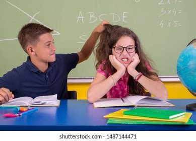 Boy Bullying Girl By Pulling Hair Stock Photo 1487144471 | Shutterstock