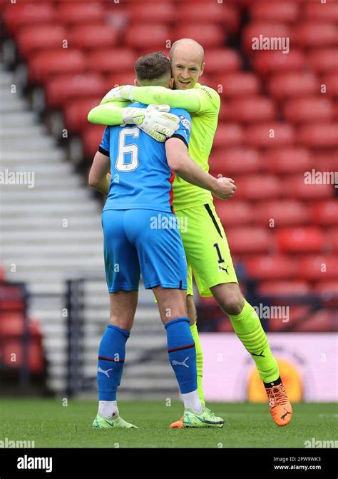 Inverness Caledonian Thistle's Daniel Devine (left) and Mark Ridgers celebrate after the ...