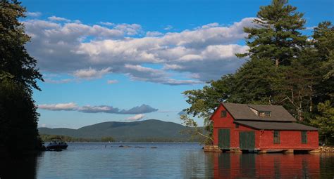 A red boathouse on Squam Lake in New Hampshire. | Lake retreat, House ...