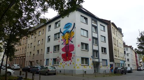 appartment house Adlerstraße 28 by Wark, Wark de Rocinha - Street Art Cities