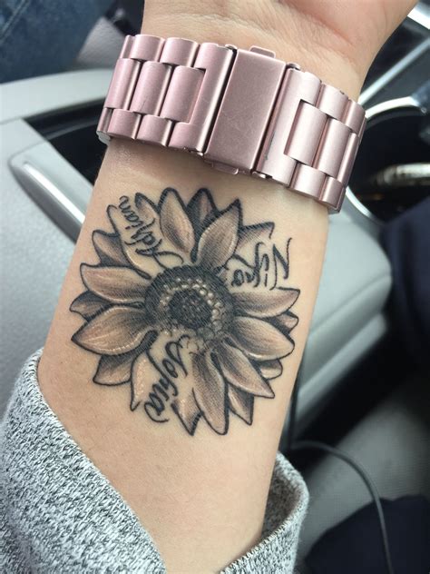 Sunflower with my kids name | Tattoos for daughters, Beautiful small tattoos, Sunflower tattoo ...