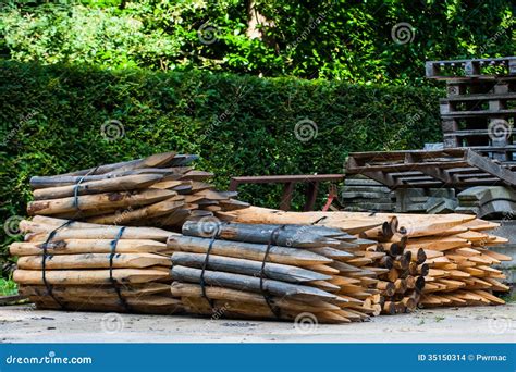 Wooden Poles Used For Fencing Stock Photo - Image: 35150314