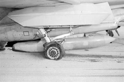 Florida Memory • Close up view showing the starboard main mount landing gear of an F-14 Tomcat ...