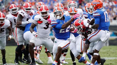 Florida, Georgia meet in playoff elimination game with Gators looking to continue their ascent ...