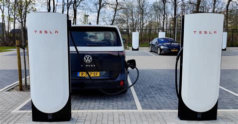 Here’s the world’s first Tesla V4 Supercharger charging a VW ID Buzz - The Verge