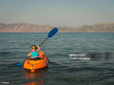 Girl Kayaking On Lake High-Res Stock Photo - Getty Images