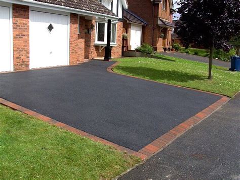 Asphalt drive red brick edge | Tarmac driveways, Driveway design, Brick ...