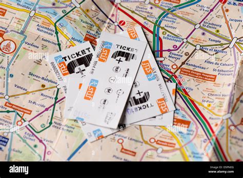 Paris metro tickets on subway plan Stock Photo - Alamy