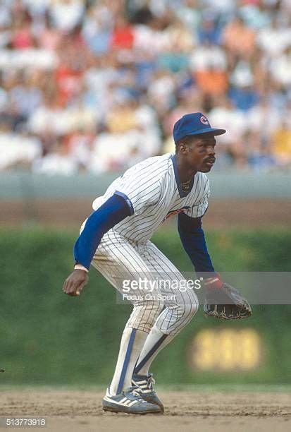 Shawon Dunston of the Chicago Cubs down and ready to make a play on the ball during an Major ...