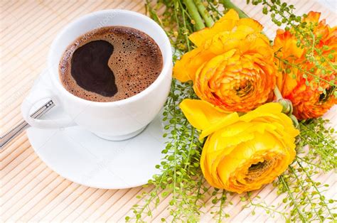 Coffee and flowers — Stock Photo © manera #10199319