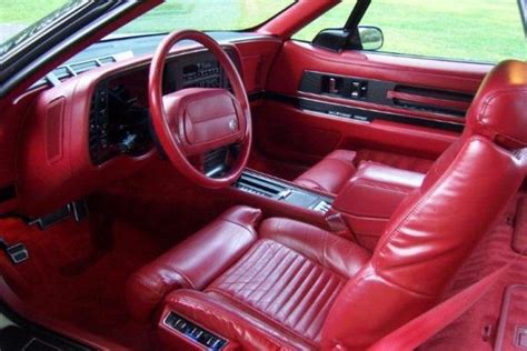 1990 Buick Reatta interior red | Mac's Motor City Garage