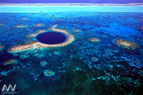 Aerial photo of Great Blue Hole off the coast of Belize. | Great blue ...