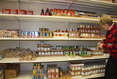 stocking-the-shelves-1 – Kent County Food Pantry