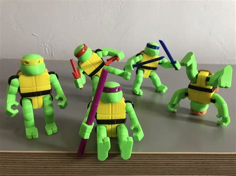 Designed a set of 3D-printable TMNT action figures for my kids, and ...