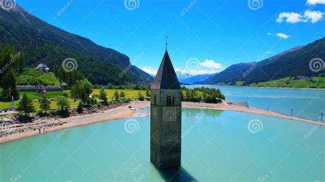 Church Tower in Lake Reschen - South Tyrol - Italy - 4k Drone Photo Stock Image - Image of ...