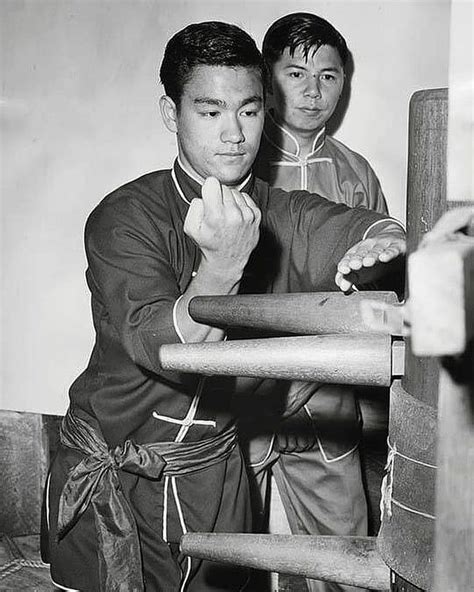 Bruce Lee training with wooden Wing Chun dummy, Seattle, 1961. Side Not ...