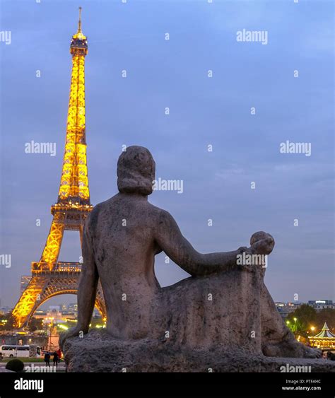 Paris, France - November 2017: Eiffel tower illuminated at dusk. The ...