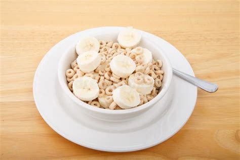 Round Oat Cereal With Sliced Banana Royalty Free Stock Photography - Image: 34887237