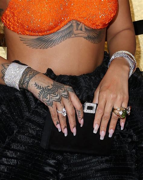 What Do Rihanna's Tattoos Mean? Here's a Guide | POPSUGAR Beauty