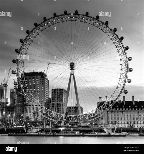 Black and White image of The London Eye and County Hall at dawn Stock Photo - Alamy