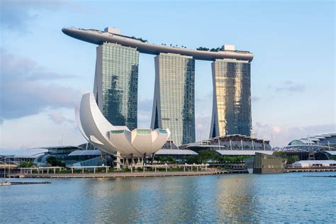 View at the Marina Bay with the iconic landmarks of The Helix Bridge in ...