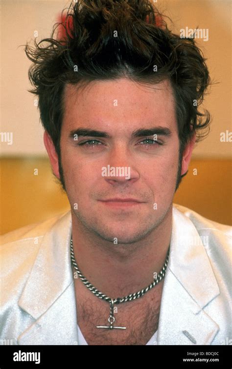 ROBBIE WILLIAMS - UK singer in 1996 Stock Photo, Royalty Free Image: 25478444 - Alamy