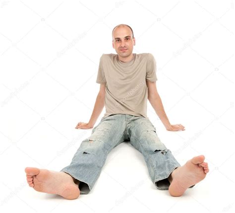 Relaxed man sitting on the floor — Stock Photo © spaxiax #4042087