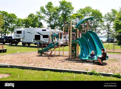 Two young boys enjoy camping at Kelleys Island State Park Stock Photo - Alamy