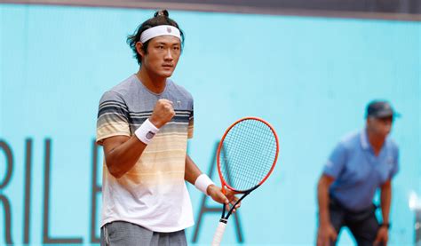 WATCH: Zhizhen Zhang continues 'unbelievable' run in Madrid with upset ...