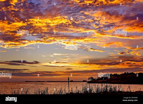 A stormy afternoon gives way to a dramatic sunset over Coden Beach ...