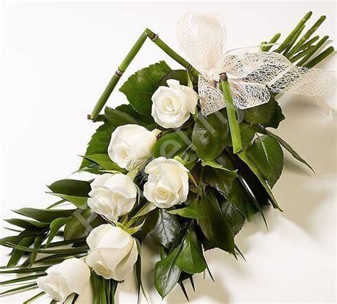 Funeral bouquet of white roses