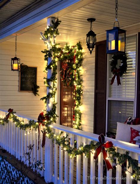 Our Christmas front porch (with hanging candle lanterns)