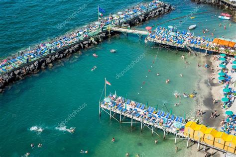 View of Sorrento, Italy. Beach and bathers – Stock Editorial Photo ...