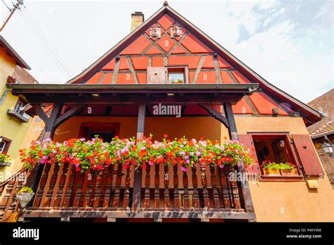 Eguisheim is a typical colorful village of Alsace, France Stock Photo ...