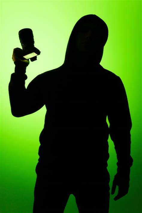 Silhouette Of Person Holding A Camera · Free Stock Photo