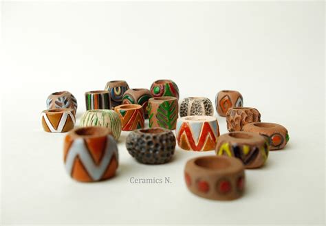 Beads on dreadlocks on Behance