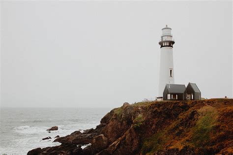 White lighthouse on rocky cliff | Dmitri Revyakin - CGarchitect ...