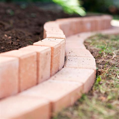 How to Plant A Curved Brick Flowerbed Border | Brick garden edging ...