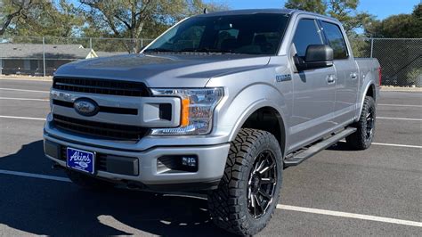 ICONIC Silver Ford F-150 Covert Leveled on 33.5s Akins Custom by Wild Willies - YouTube