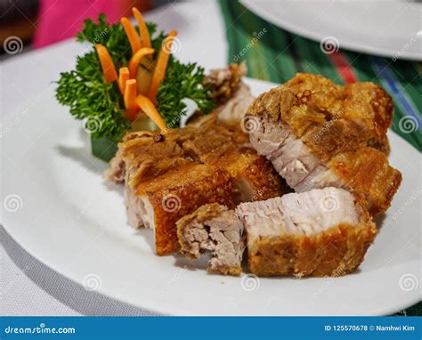 Traditional Filipino Food - Lechon Kawali Stock Photo - Image of carrot, fried: 125570678