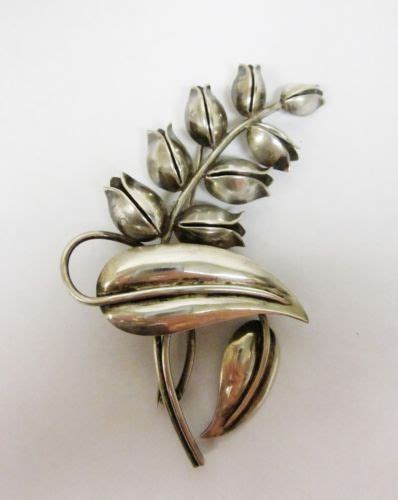 326 best images about georg jensen brooches on Pinterest | Brooches, Sterling silver flowers and ...