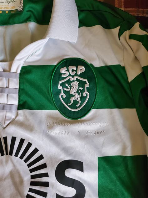 My Sporting Lisbon jersey has braille for the club's name beneath the logo : r/mildlyinteresting