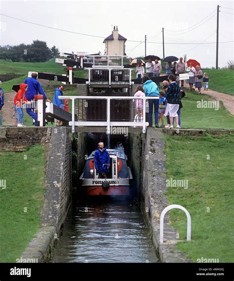 A canal boat entering Foxton Locks on the Grand Union Canal near Market Harborough ...