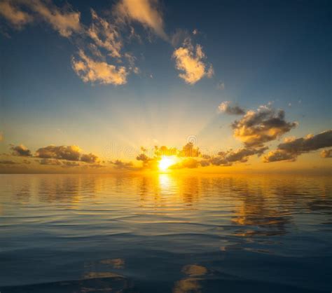 Beautiful Sunset Reflected in a Calm Peaceful Ocean As Concept for Peace Stock Image - Image of ...