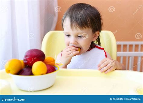 22 Months Baby Eating Fruits Stock Image - Image of childhood, spoon: 46175843