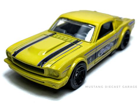 Hot Wheels 65 Mustang 2+2 Fastback Series 2019 Muscle Mania (สีเหลือง) 1:64