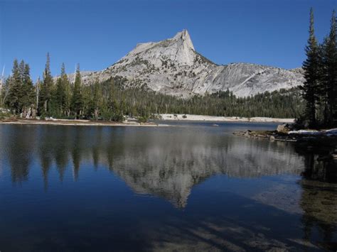 Cathedral Peak, Yosemite National Park, California - reflected in Lower Cathedral Lake ...