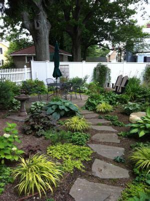 cul-de-sac front yard landscaping - Google Search | Landscaping ideas | Sloped garden, Shady ...